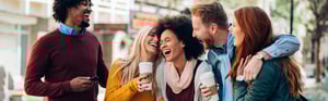 A group of young peopletalking and laughing and having a good time