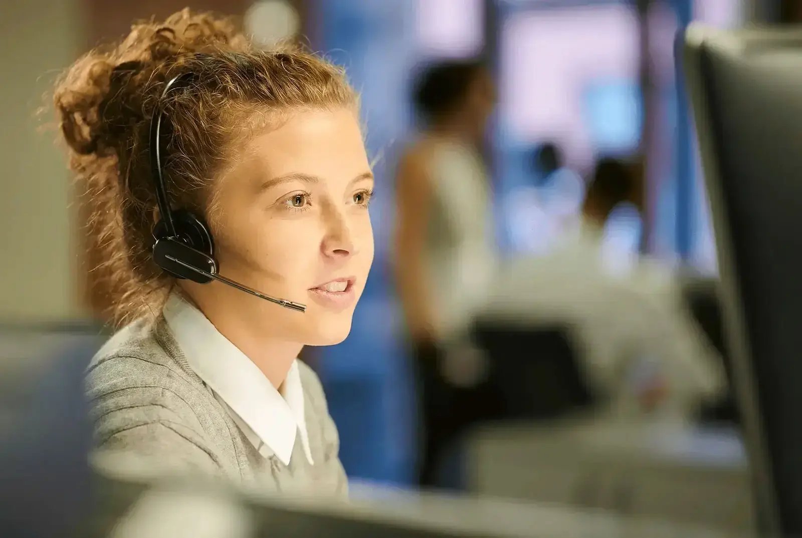 operations salesperson with a headset 